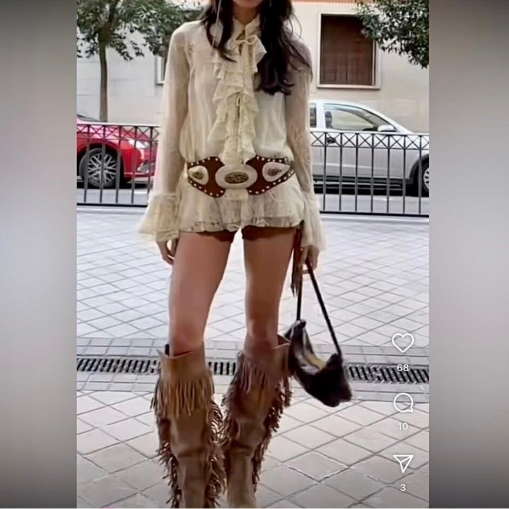 Fringed suede boots.
